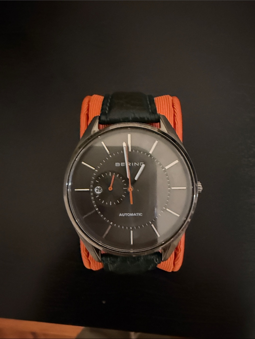 Bering Men's Black Dial Automatic Watch with Orange Accents